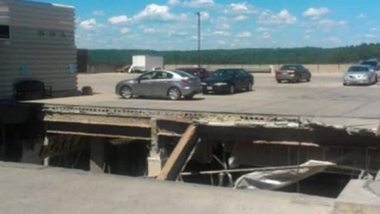 A hole in the rooftop parkade at the Algo Centre mall shows where the roof caved in on June 23, 2012. 