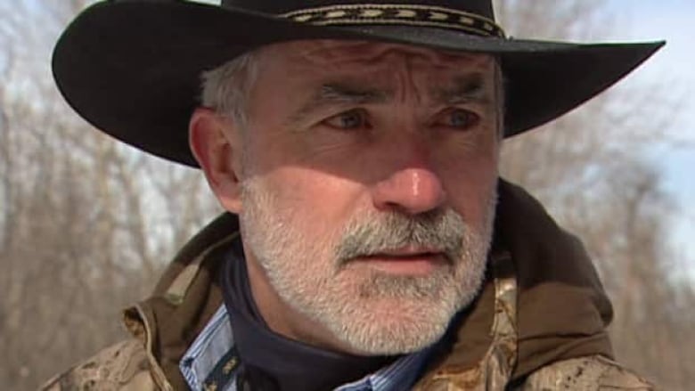 Close-up of Terry Grant wearing a cowboy hat.