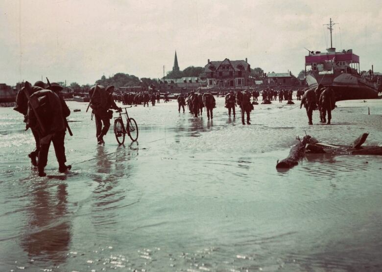 Canadian soldiers land on a Normandy beach during the D-Day invasion on June 6, 1944.  