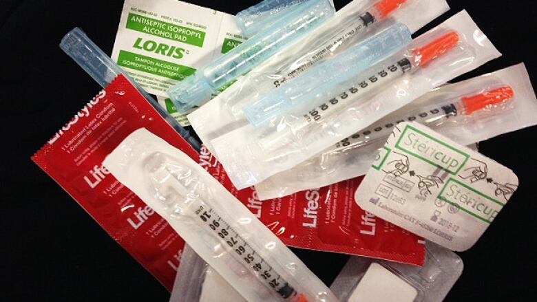 The contents of a kit distributed by Montreal Public Health in pharmacies and community organizations: syringes, sterilized water, mixing cups, condoms and alcohol swabs.