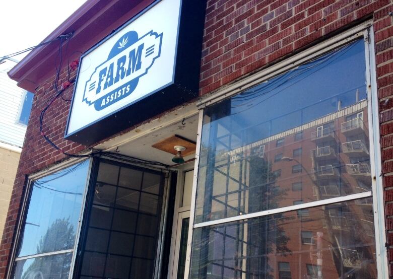 A storefront with a sign that says 'Farm Assists' is shown.