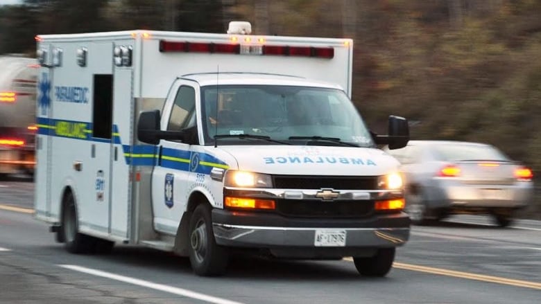 An ambulance on the road.