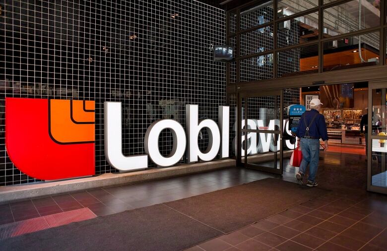 A large Loblaw sign is displayed at a store in Toronto.