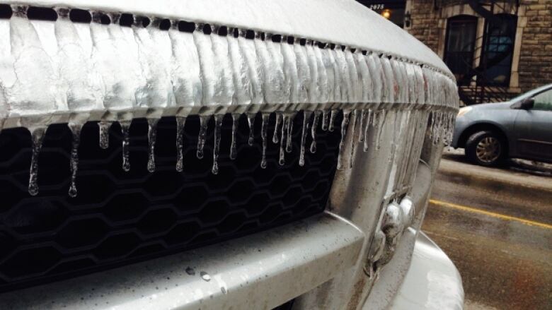 A vehicle with ice on it.