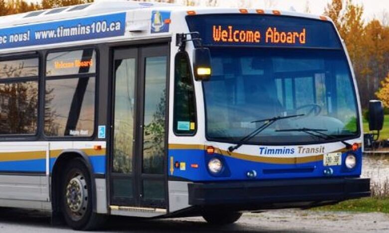 A Timmins transit bus with a sign that reads 'Welcome aboard.'