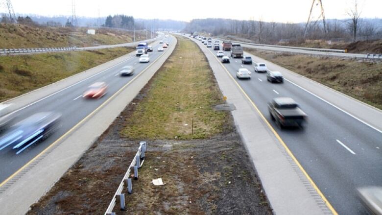 cars drive on highway