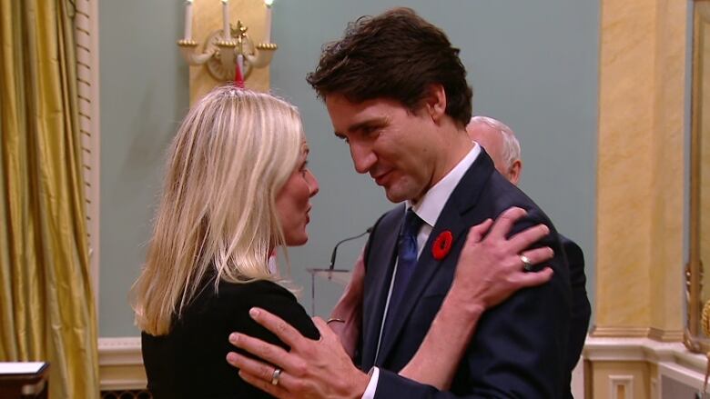 Prime Minister Justin Trudeau congratulates Environment and Climate Change Minister Catherine McKenna after she was officially sworn in on Wednesday morning.