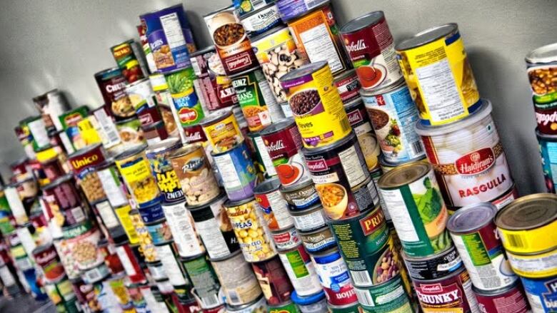 Cans of food on a shelf