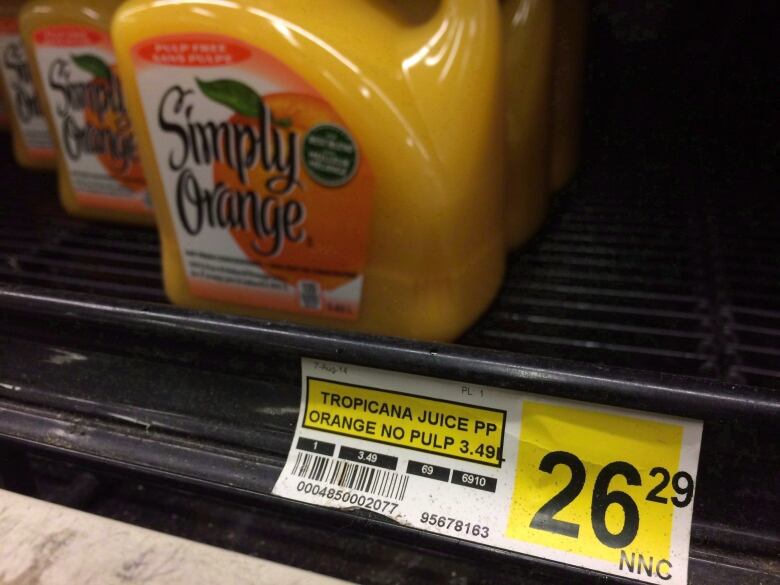 Price tag of orange juice in grocery store