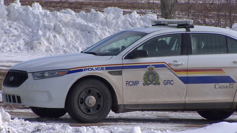 An RCMP car in the snow.