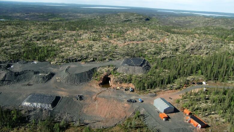 An aerial view of a green and dusty area.