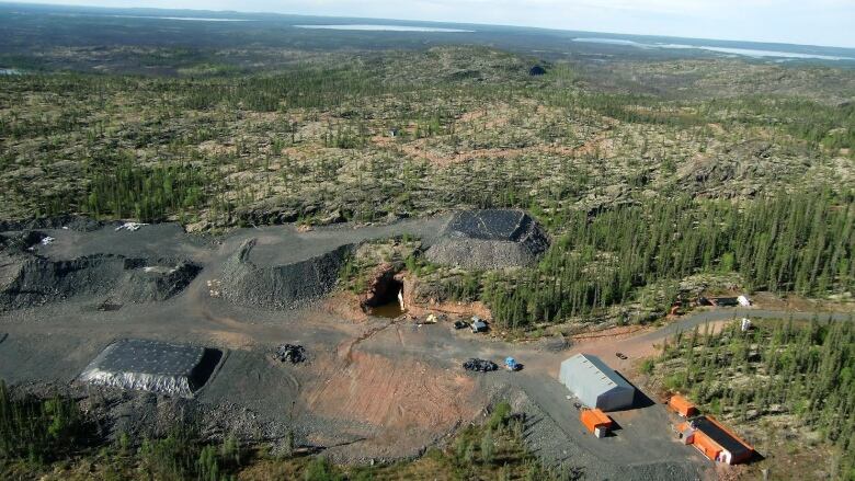 An aerial view of a green and dusty area.