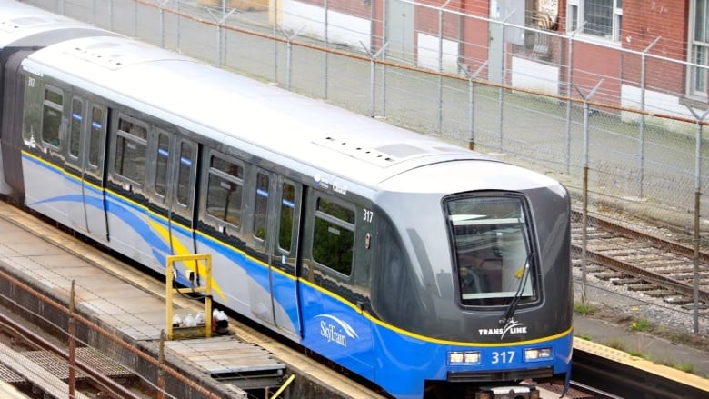 Overhead shot of SkyTrain on rails in Vancouver