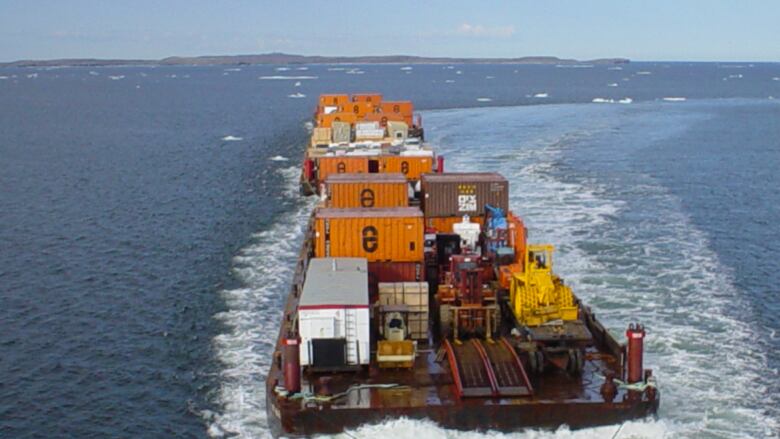 Barge on water.