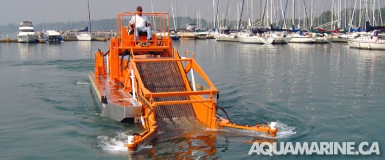 Simon Lake residents hope that the city will set aside money to help them purchase this aqua skimmer to control the buildup of floating algae.