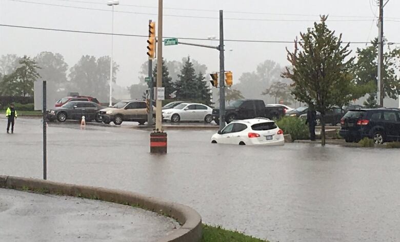 Another vehicle got stuck near the entrance to Tecumseh Mall.