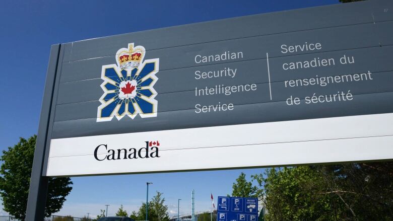 A Canadian Security Intelligence Service sign in pictured on a sunny day.