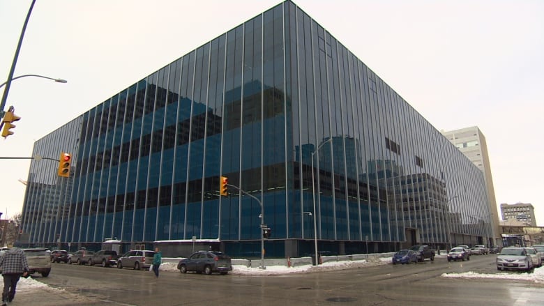 The blue external facade of the Winnipeg Police Headquarters.