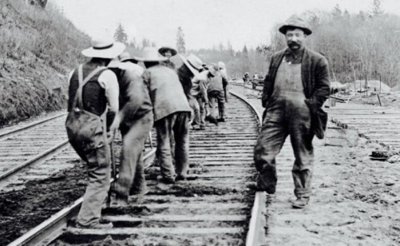 Workers building the railroad in the 1880s. 