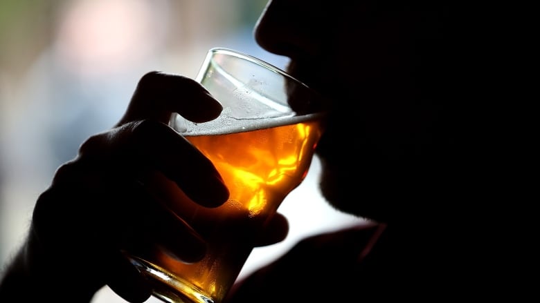 A man drinking beer