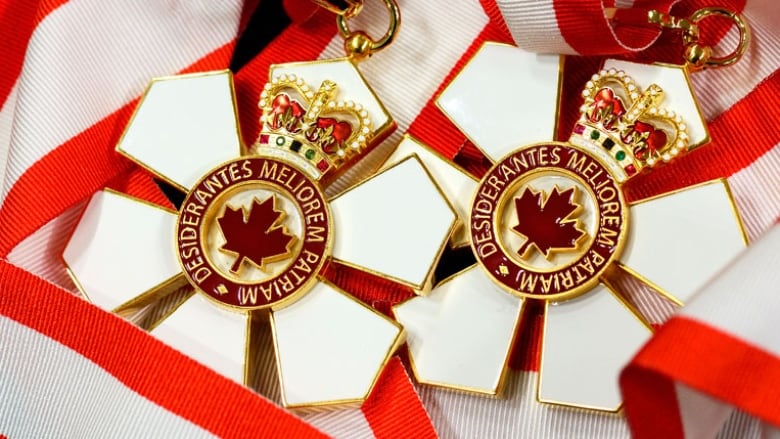 Photograph of two Order of Canada medals