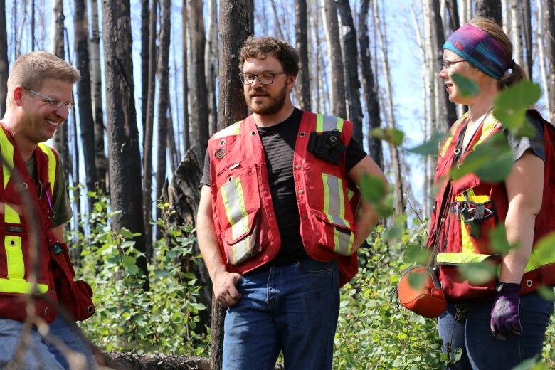 Canadian Forest Service researcher Brad Pinno (L to R) chats with his researchers and graduate students Ryan Lalonde and Stephanie Jean. 