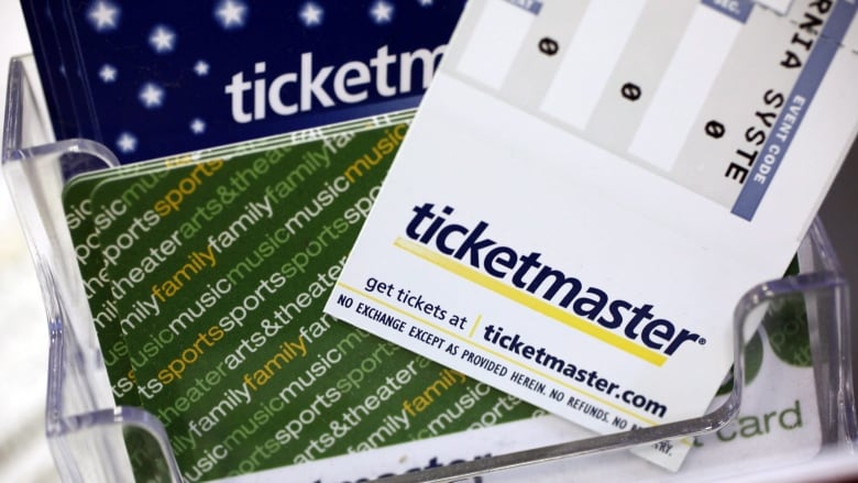 A close-up of a paper ticket to an event.