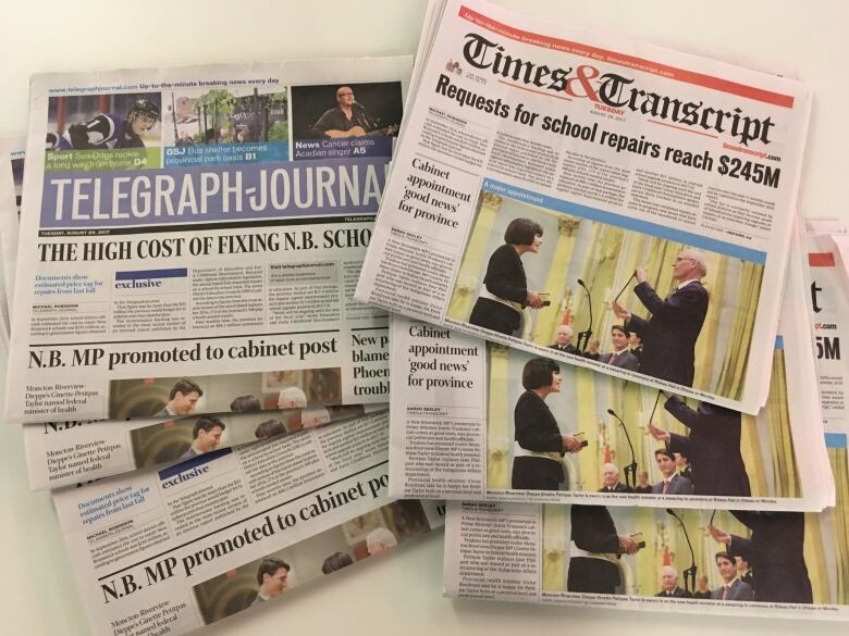 The front pages of newspapers printed in New Brunswick.