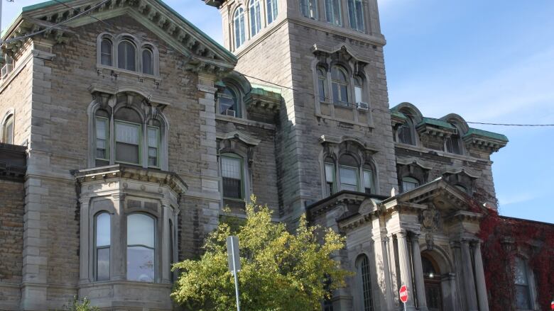 Victorian greystone seen from below.