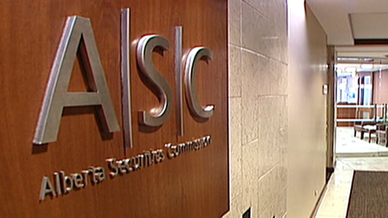 A sign shows the Alberta Securities Commission.