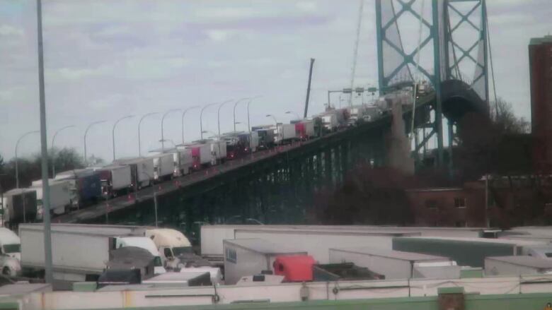 Canada-bound trucks backed up on the Ambassador Bridge on March 23, 2018.