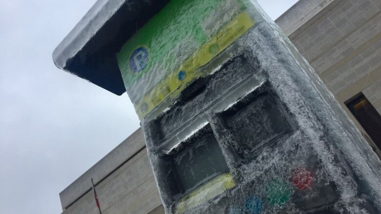 This parking meter outside the Ottawa courthouse was totally encased in ice, making it impossible to push the buttons or insert credit cards.