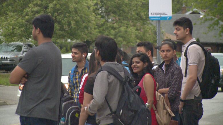 This bus stop at the corner of Campbell Avenue and Wyandotte Street is used by many international students.