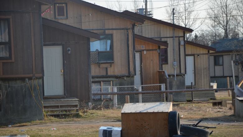 A row of wood-sided houses.