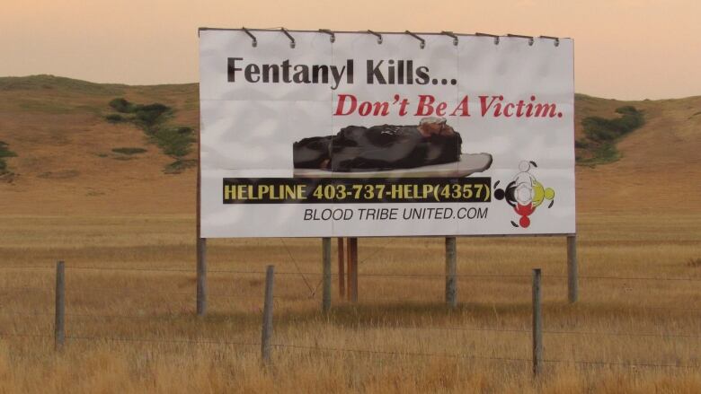 A billboard is seen on a smoky day.