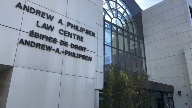 An exterior shot of a large institutional building with the words 'Andrew A Philipsen Law Centre' written on the side.