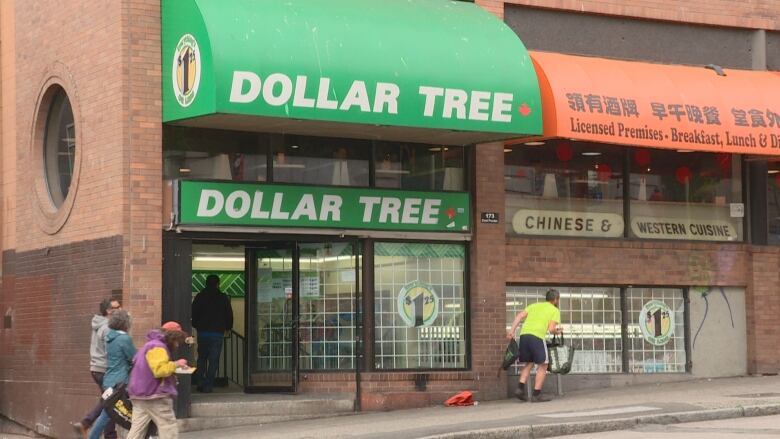 A small Dollar Tree store on a street corner.