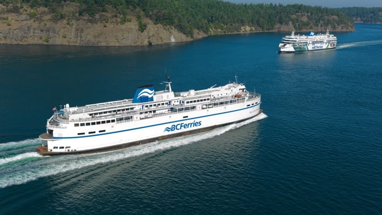 A large ferry on the water.