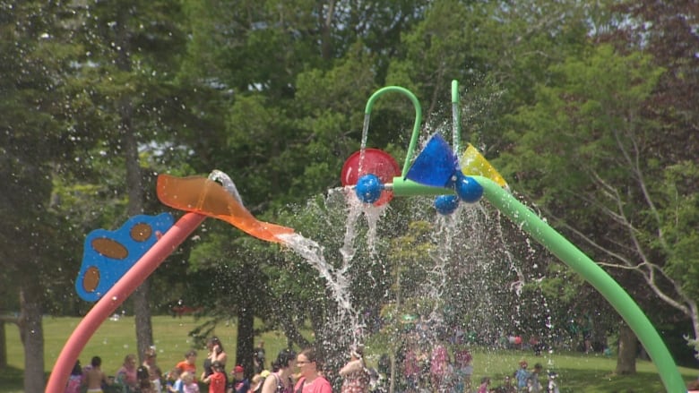 Water pouring out of splash pad.