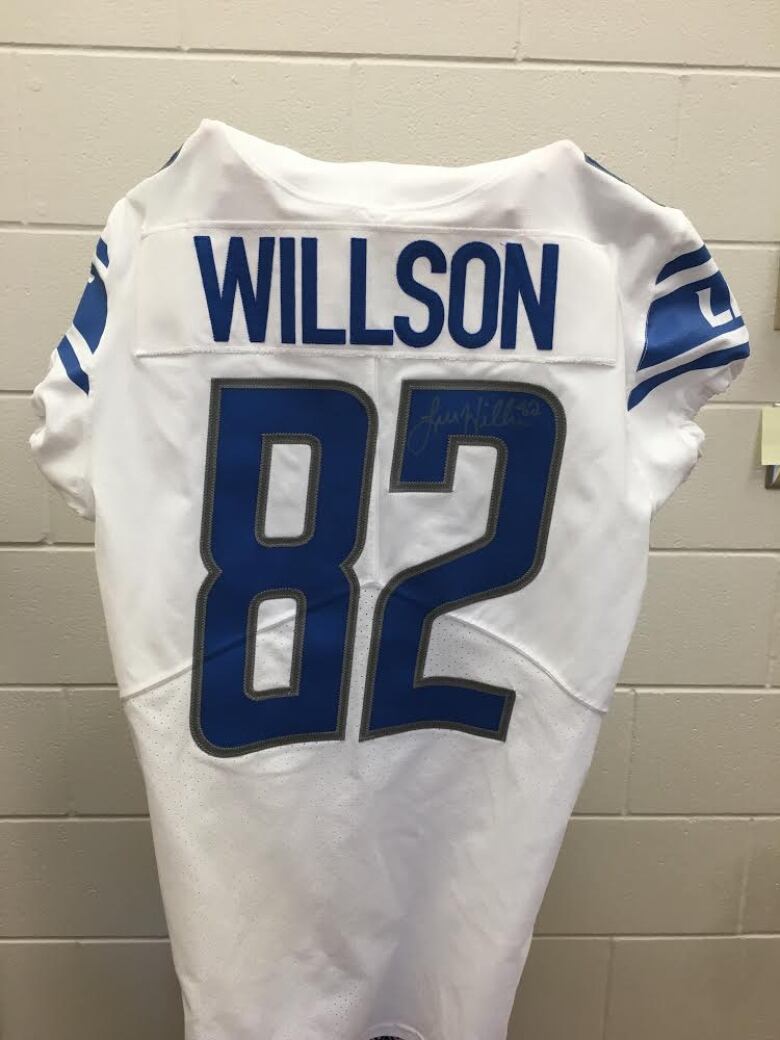 The University of Windsor is offering $20 raffle tickets, with proceeds benefiting the Shawn Yates Memorial Scholarship. The winner will receive this autographed jersey of Luke Willson, the native of LaSalle, Ont. who signed with the Detroit Lions back in March.