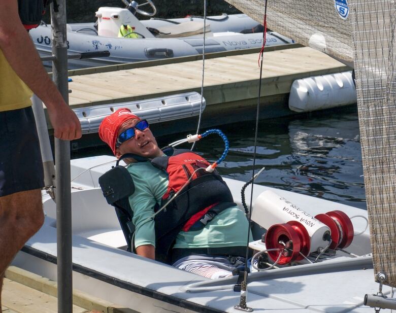 Man on sailing boat. 