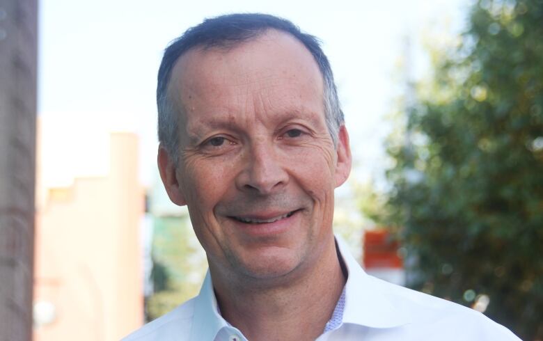 Portrait of man smiling at camera