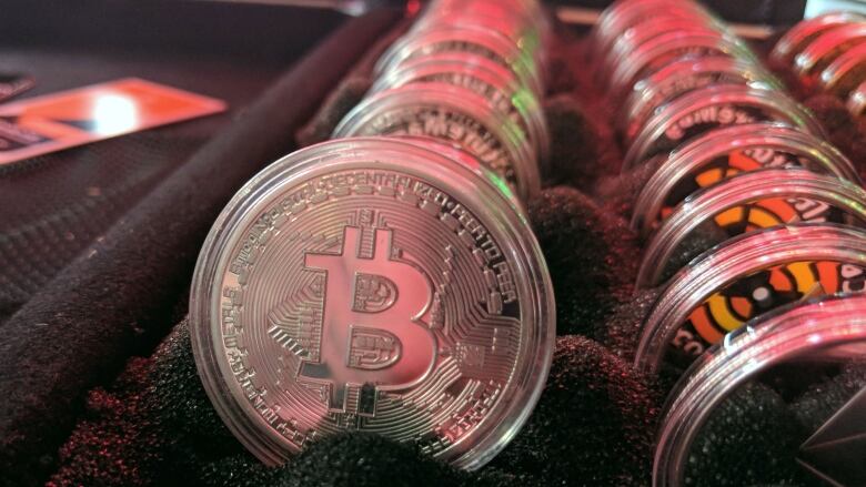 Bitcoin-shaped USB storage drives.