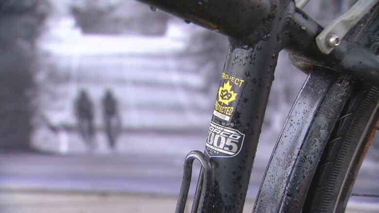 A sticker on a bike frame.