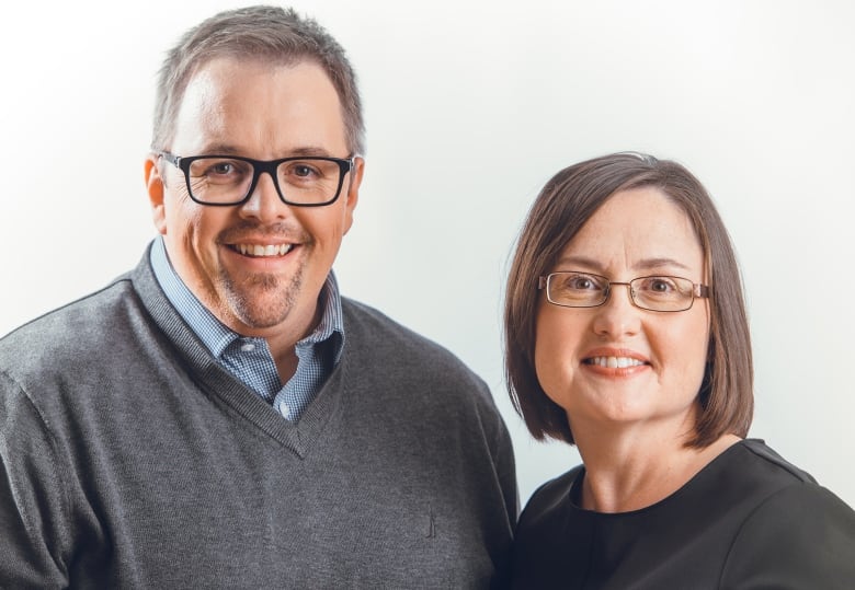 Photo of a man and a woman on white background