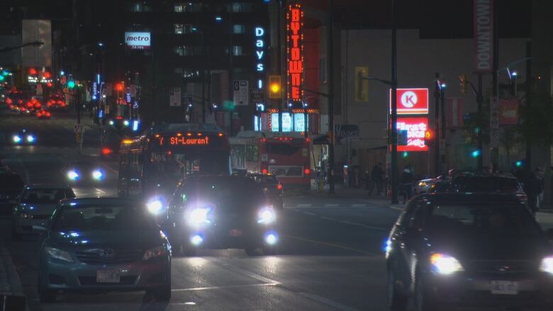 A night time photo of traffic on Rideau Street just east of King Edward Avenue.