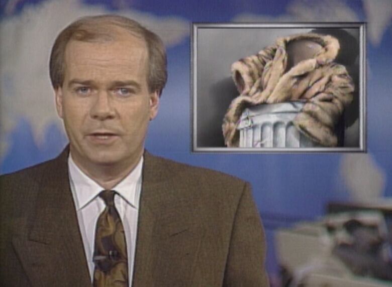 News anchor with graphic of fur coat in a garbage can