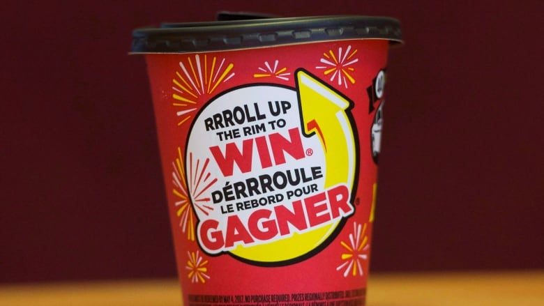 A Tims cup with old Roll Up the Rim logo