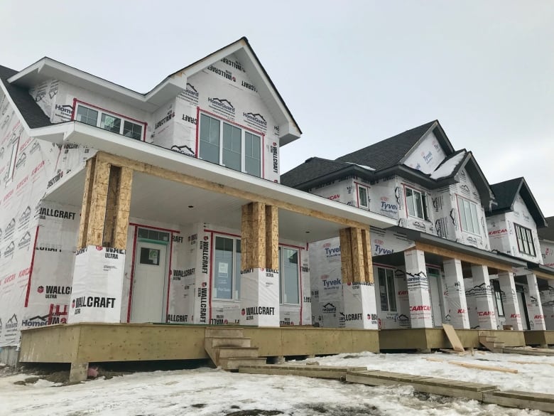 An outdoor shot of homes being built