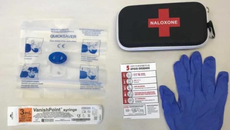 Naloxone kit supplies on a table.